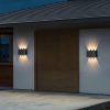 industrial wall light mounted on exterior wall with symmetrical light distribution